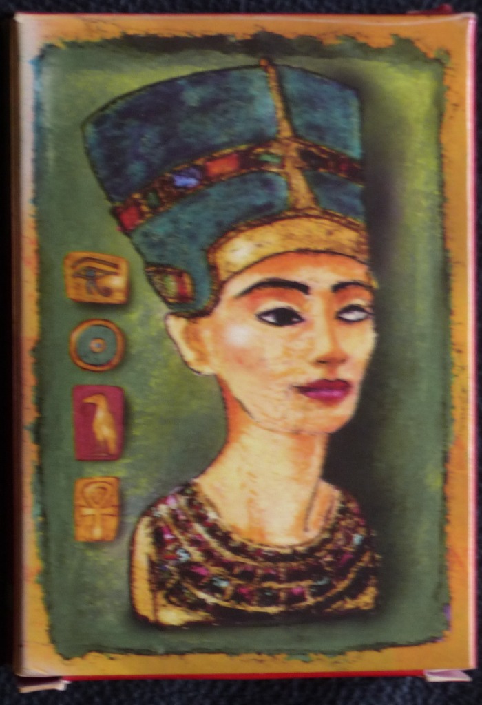 Artistic portrait of the Egyptian Queen Nefertiti in a textured, illustrated style with hieroglyphic symbols.