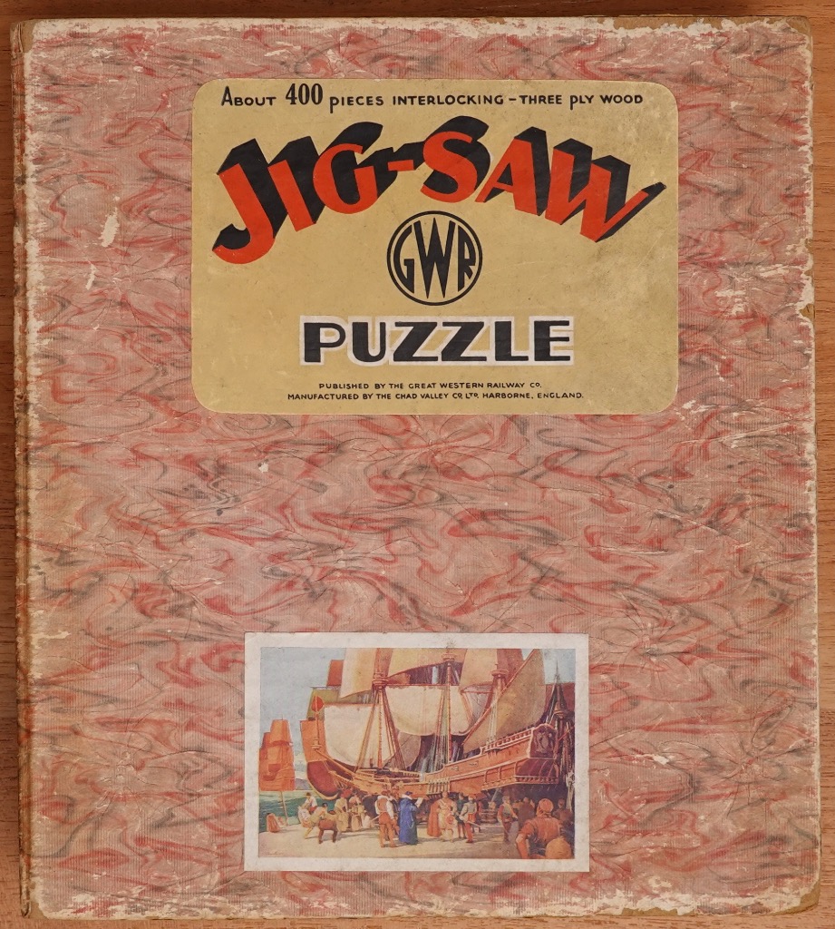 Vintage illustration of a large sailing vessel on a marbled red and grey background.