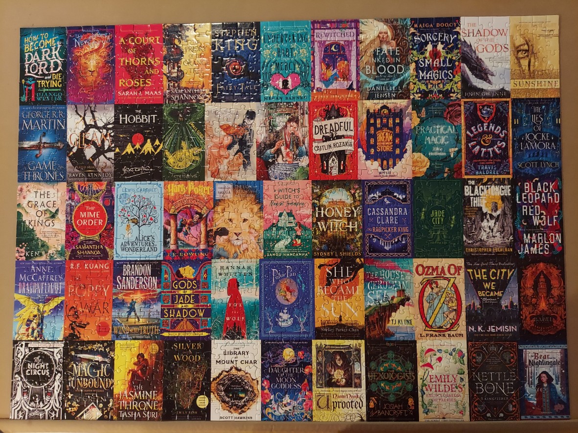 A grid of 50 fantasy and speculative fiction book covers displayed as a collage.
