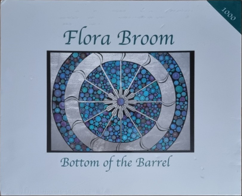 Abstract circular mandala-style art with blue and purple circles, featuring the text Flora Broom and Bottom of the Barrel.