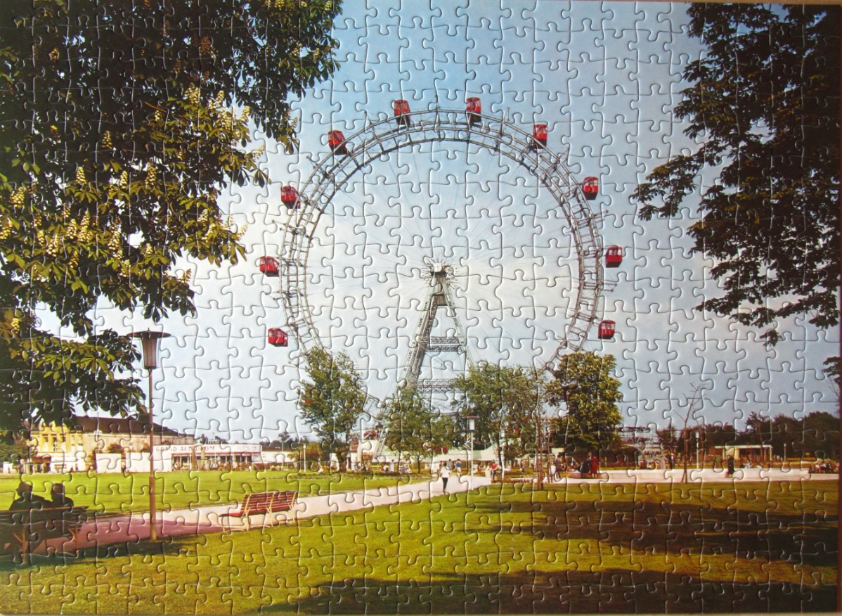 The Wiener Riesenrad ferris wheel in a grassy park setting
