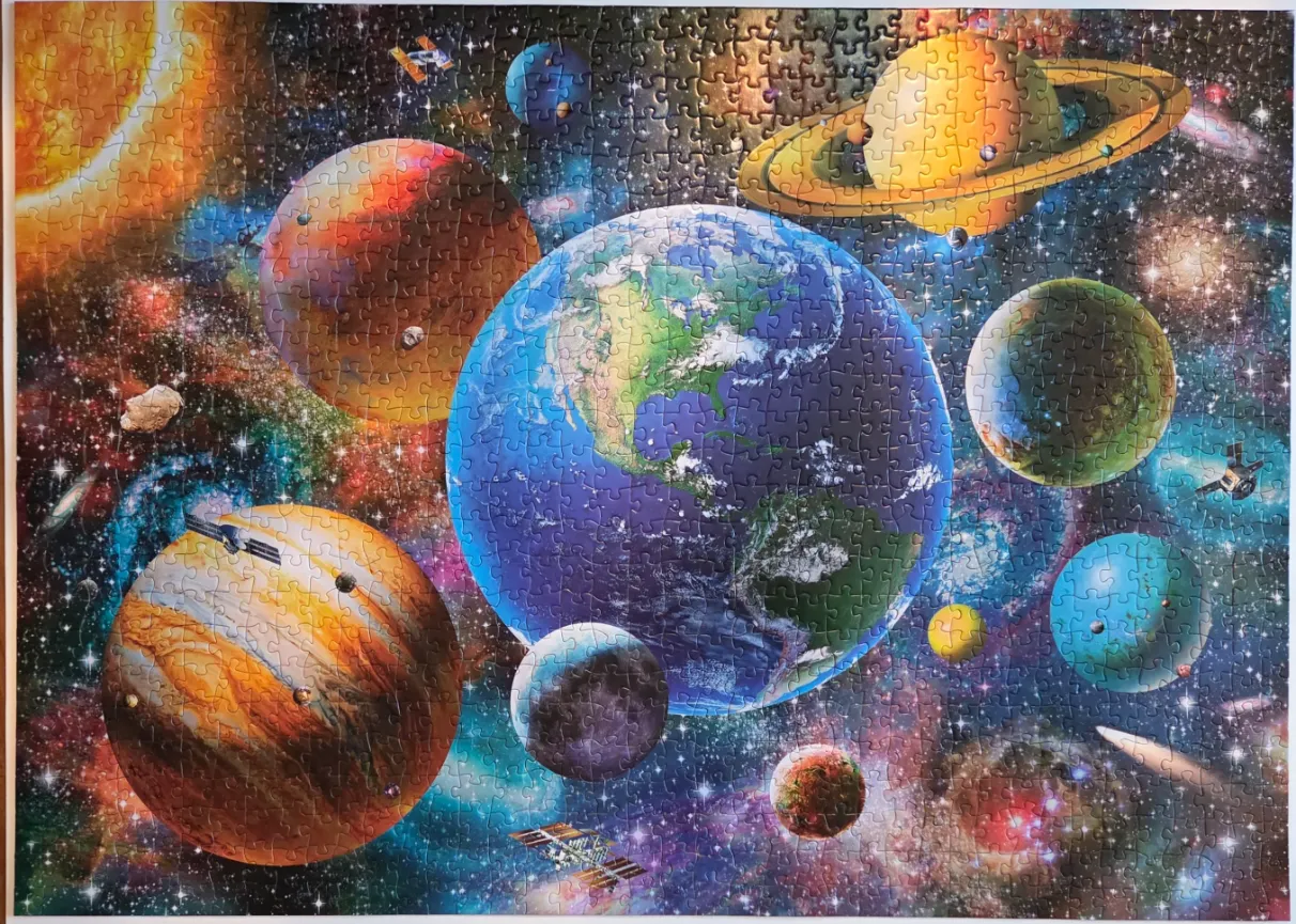 A vibrant digital illustration of Earth, other planets, moons, and satellites set against a starry deep space background.