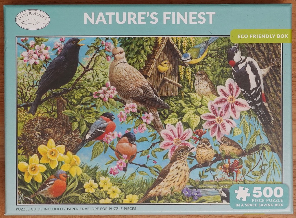 An illustration of various British birds in a lush garden setting with spring flowers.
