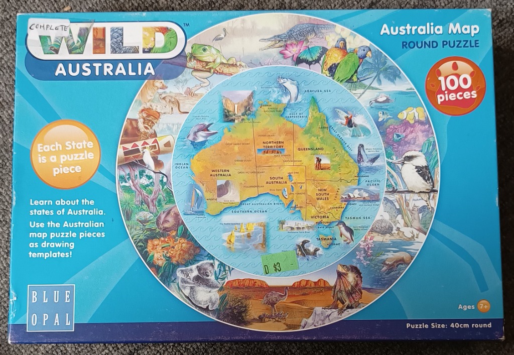 A map of Australia surrounded by wildlife illustrations including a koala, kangaroo, crocodile, and various birds.