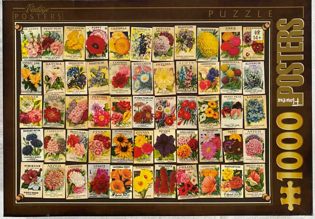 A collage of 55 vintage seed packet illustrations featuring a variety of colorful flowers.