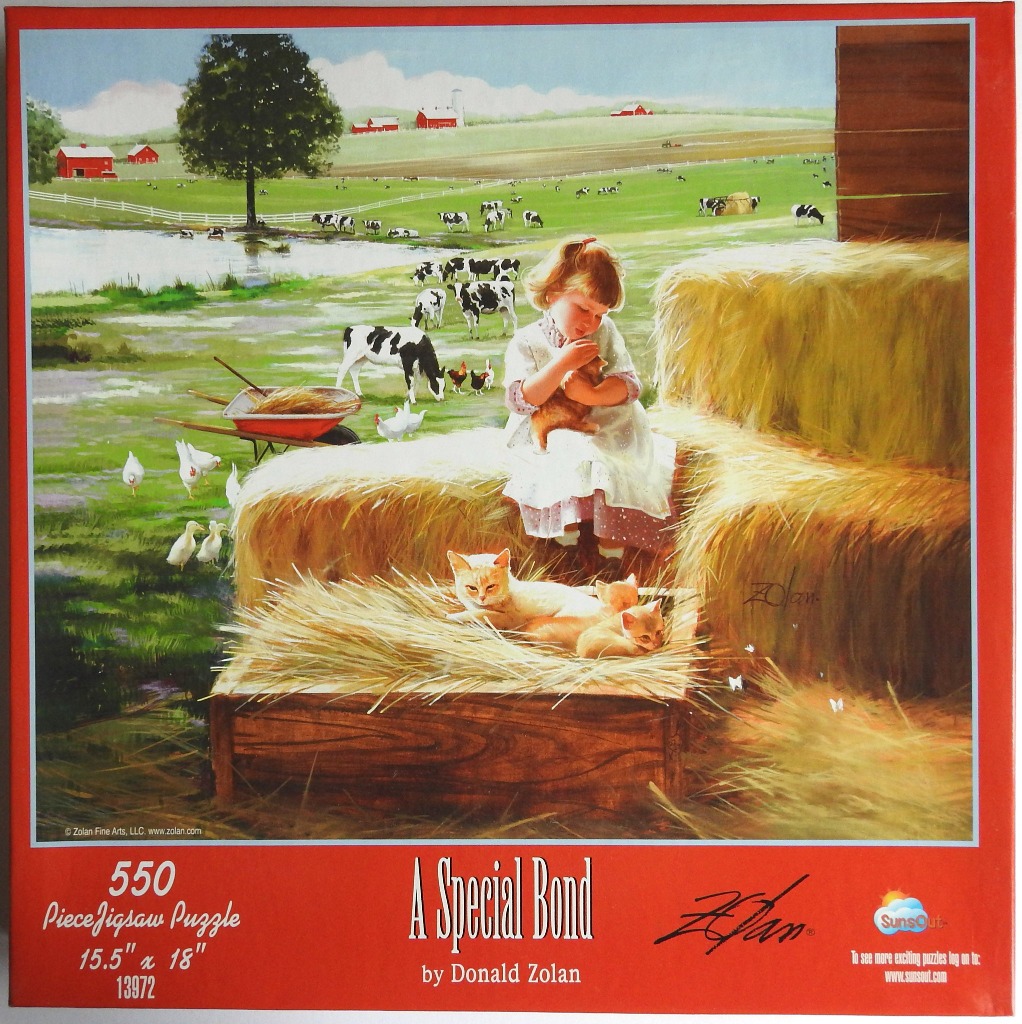A young girl sitting on hay bales hugging a kitten, with a rural farm scene in the background.