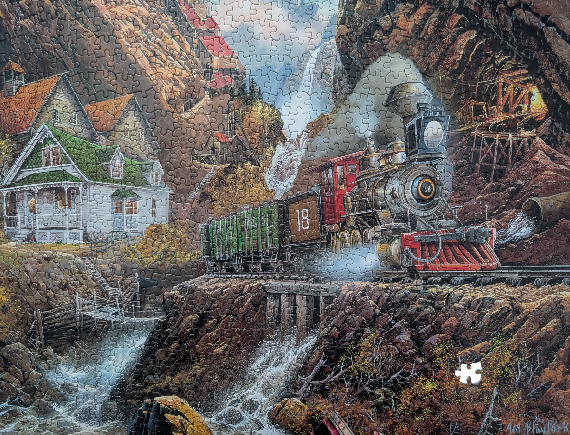 A steam locomotive passing a mountain village, waterfall, and mine entrance.