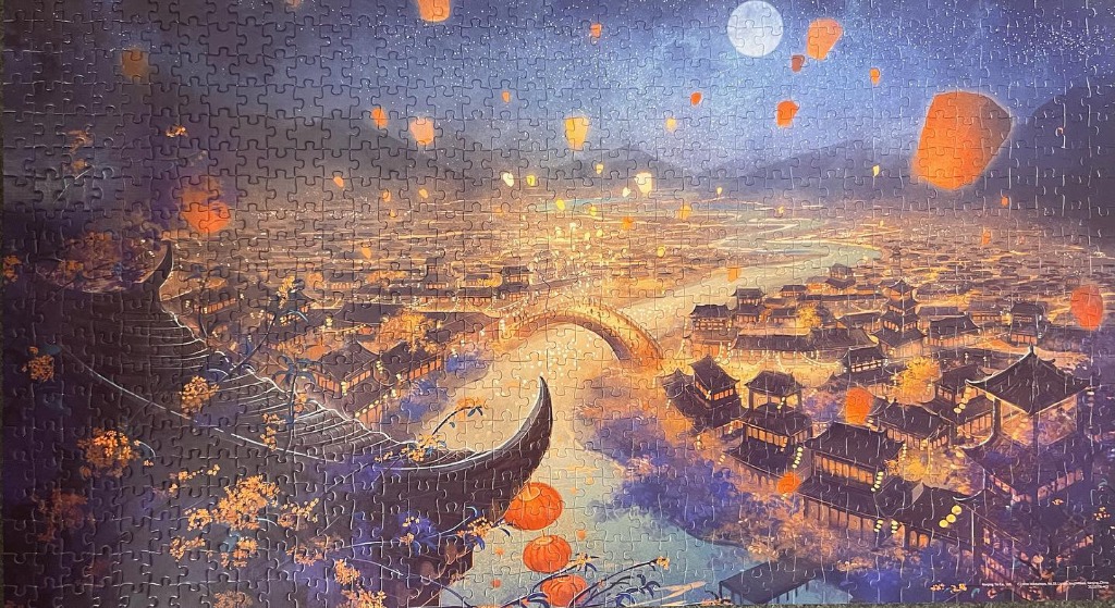 An atmospheric night scene over a traditional East Asian town with glowing lanterns and a full moon.