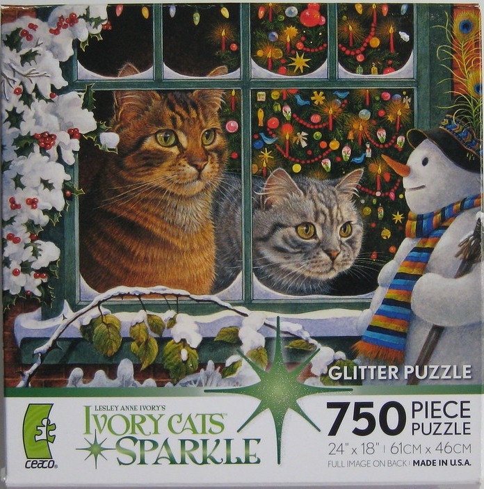 Two cats looking through a window at a decorated Christmas tree next to a snowman outdoors in the snow.