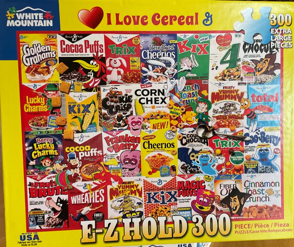 A collage of vintage cereal boxes featuring famous cartoon mascots and bright typography.