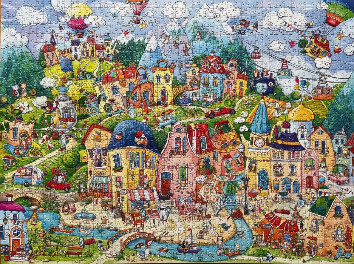 A whimsical, colourful cartoon illustration of a bustling fairy-tale town with various whimsical buildings and characters.