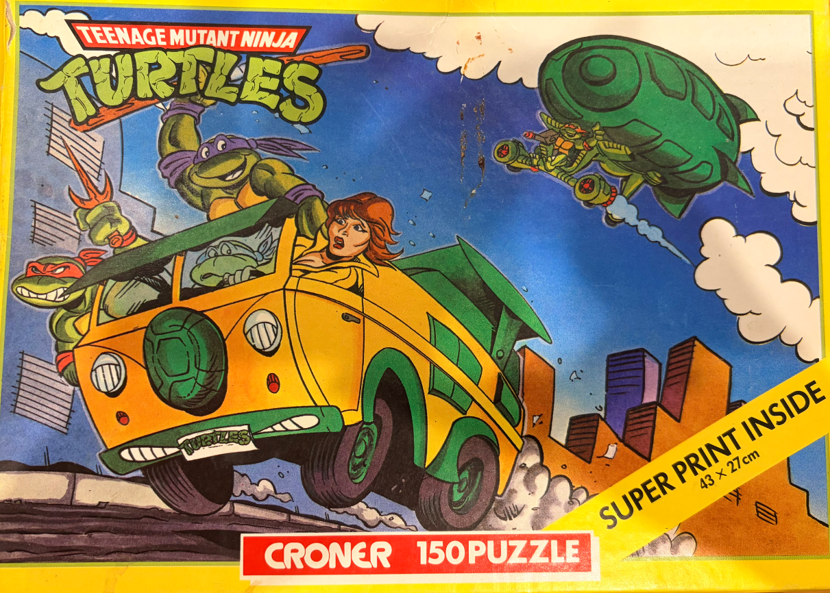 Illustration of Ninja Turtles in a yellow and green van driving through a city with one turtle flying a ship above.