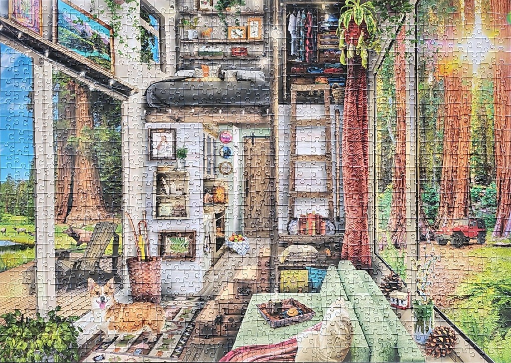 A cozy, modern tiny home interior with a Corgi, looking out into a sun-drenched redwood forest.