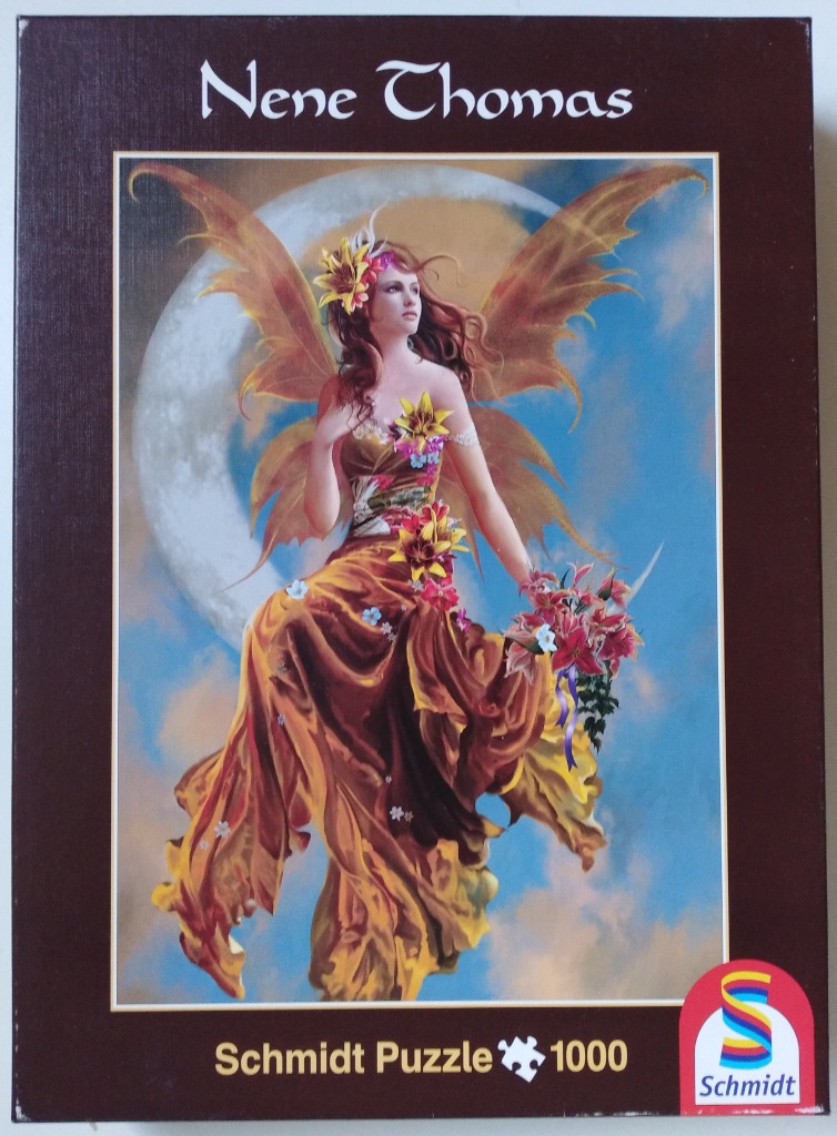 Fantasy illustration of a fairy with golden wings and a floral dress sitting on a crescent moon in the sky.