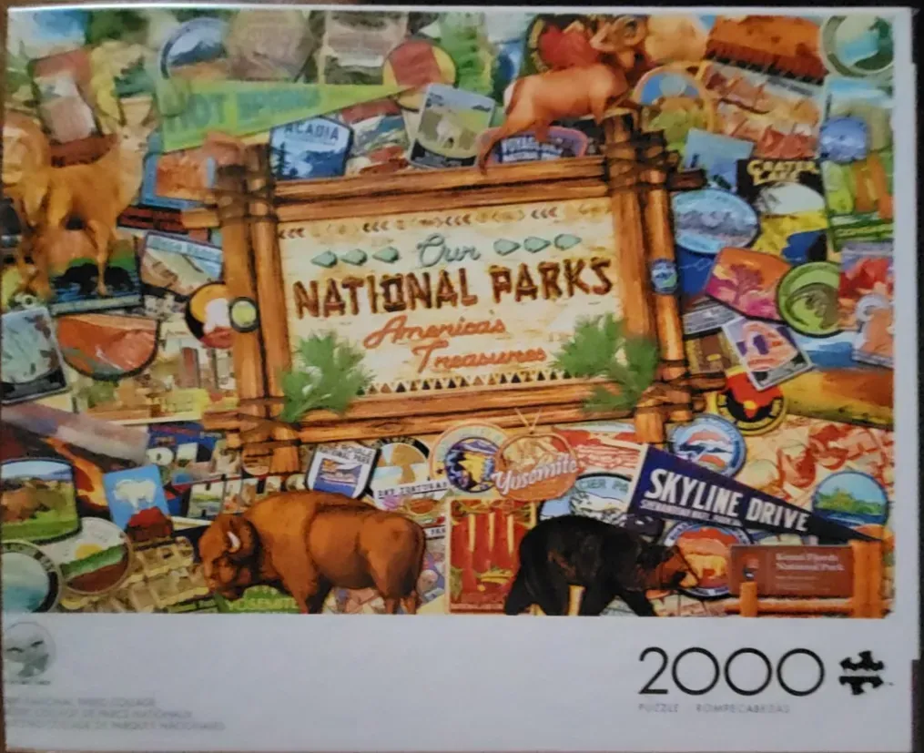 A collage of vintage-style National Park travel stickers and illustrations centered around a wooden park sign.
