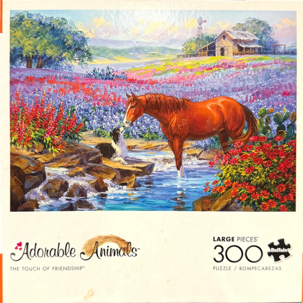 A painting of a brown horse and a black-and-white dog standing in a stream near a field of wildflowers.
