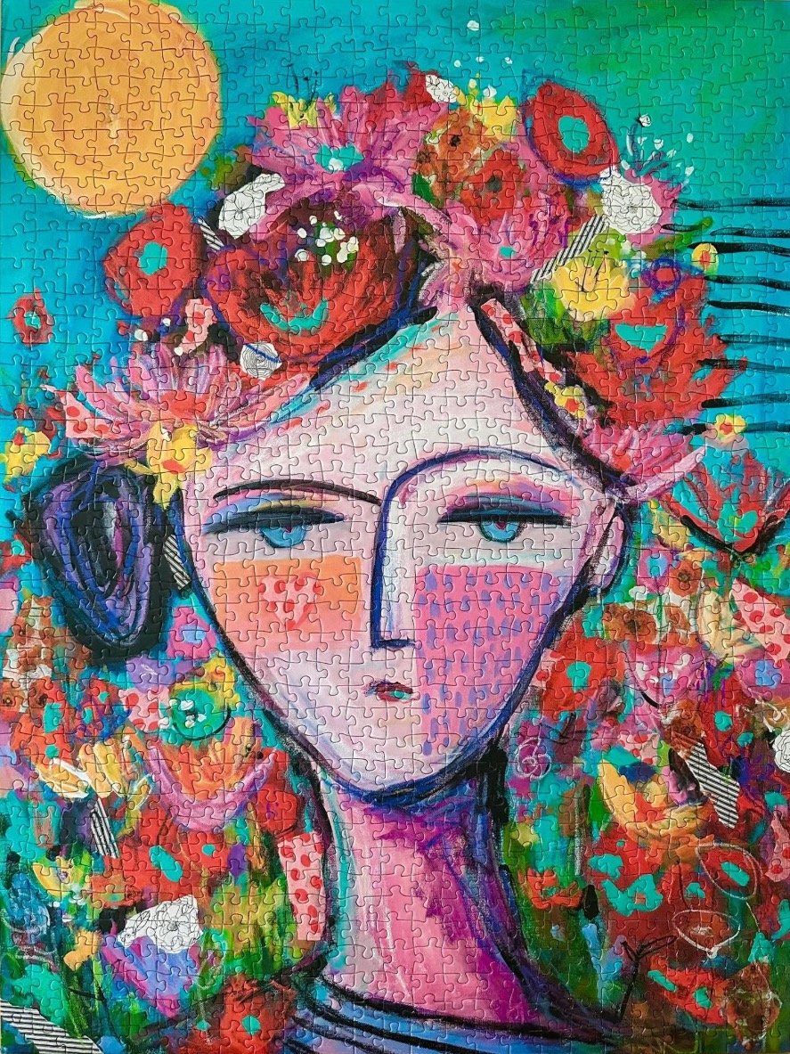 Stylized painting of a woman with blue eyes and a large, vibrant floral headdress against a turquoise background.