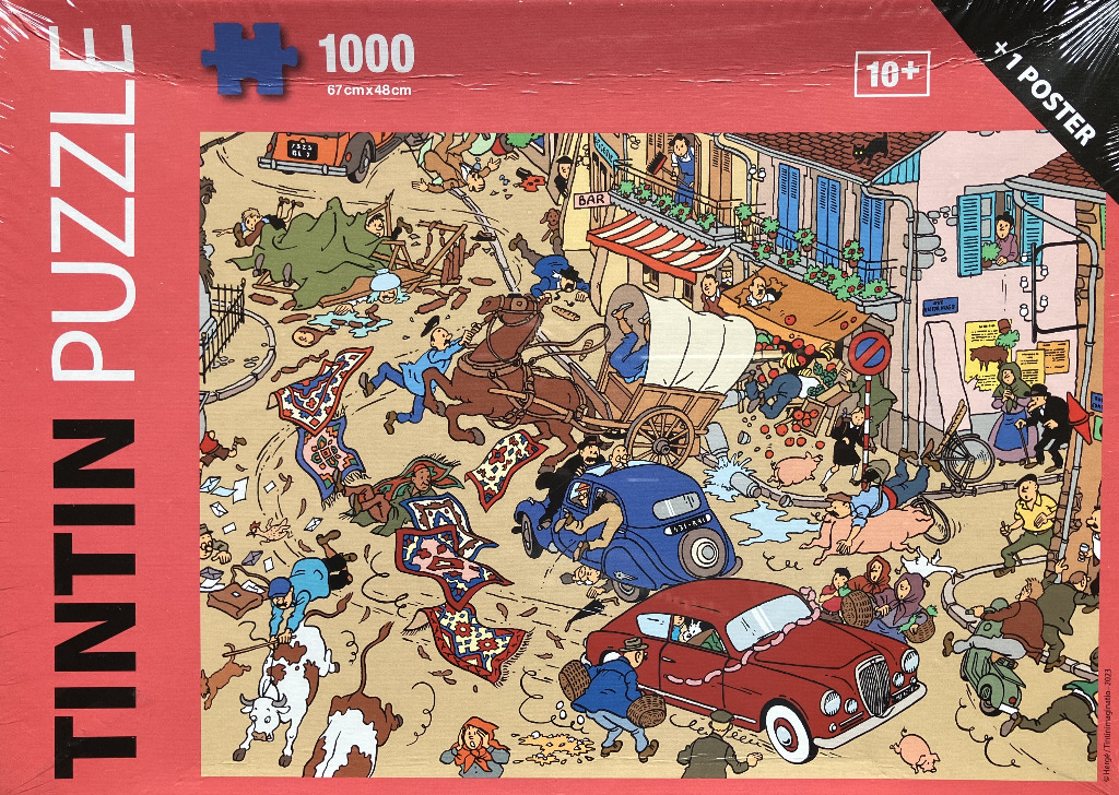 A chaotic comic-style illustration showing a busy street scene filled with people, animals, and vehicles in a French town.