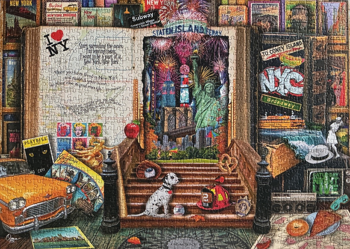 A collage celebrating New York City featuring an open book, the Statue of Liberty, and iconic city imagery.