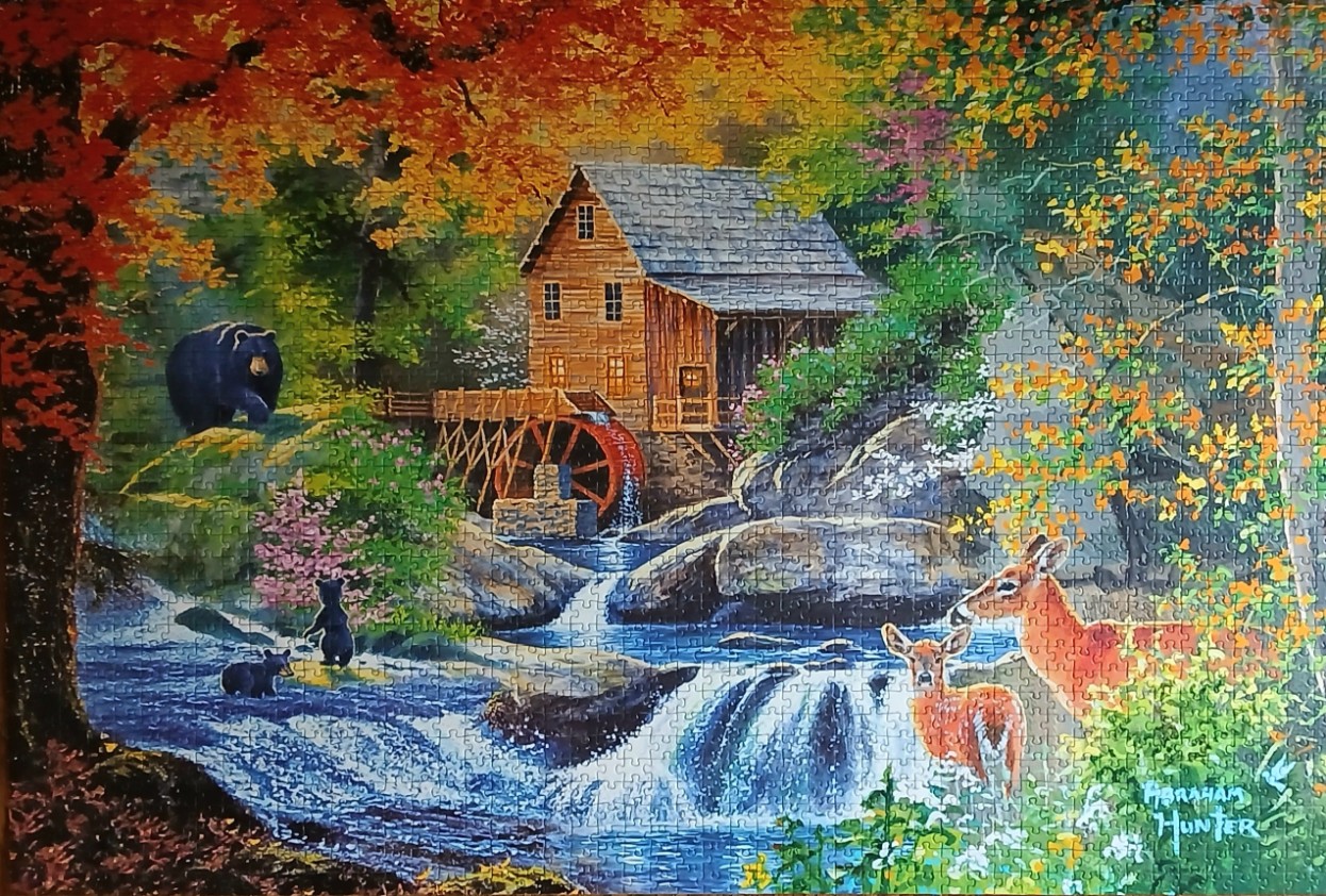 A rustic watermill beside a waterfall in an autumn forest with bears and deer.