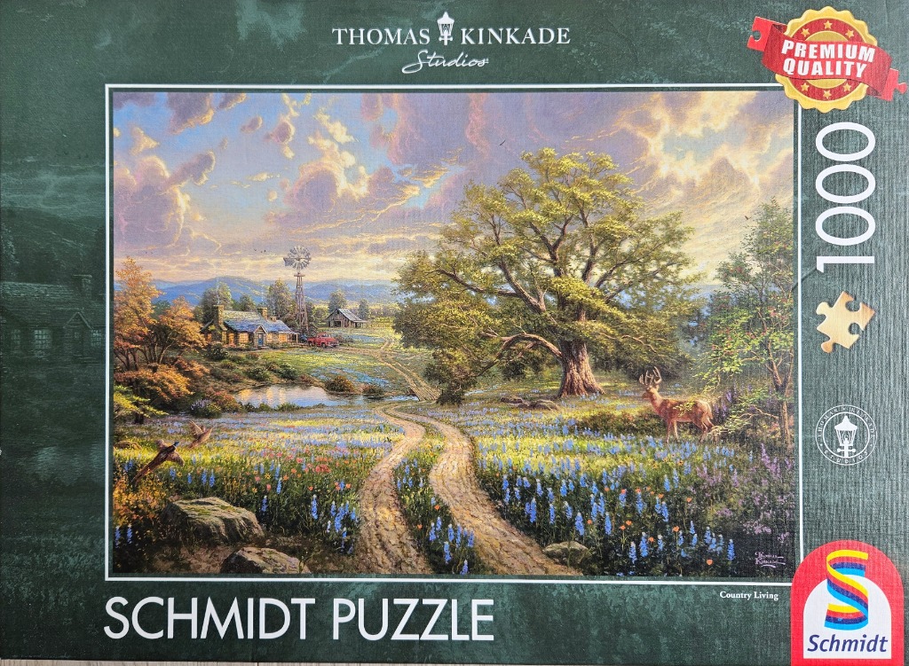 A peaceful landscape painting of a cottage, a large oak tree, and a field of blue flowers under a golden sunset sky.