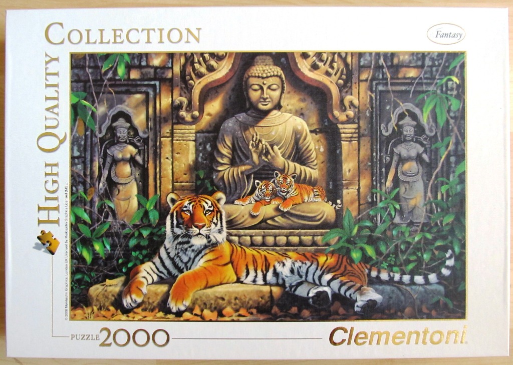 A peaceful scene of an adult tiger and two cubs resting in front of a stone Buddha statue in a jungle ruin.