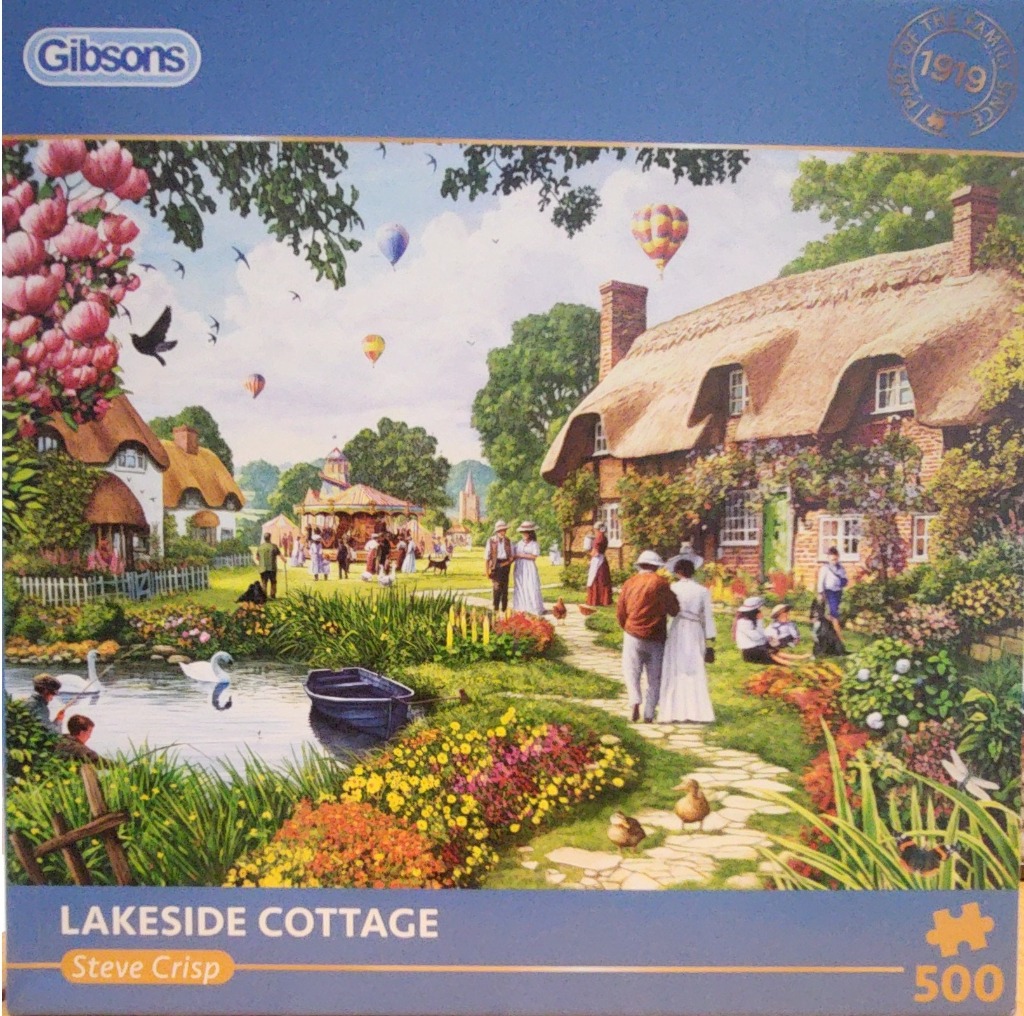 A peaceful English countryside scene featuring thatched-roof cottages, a pond with swans, and hot air balloons.