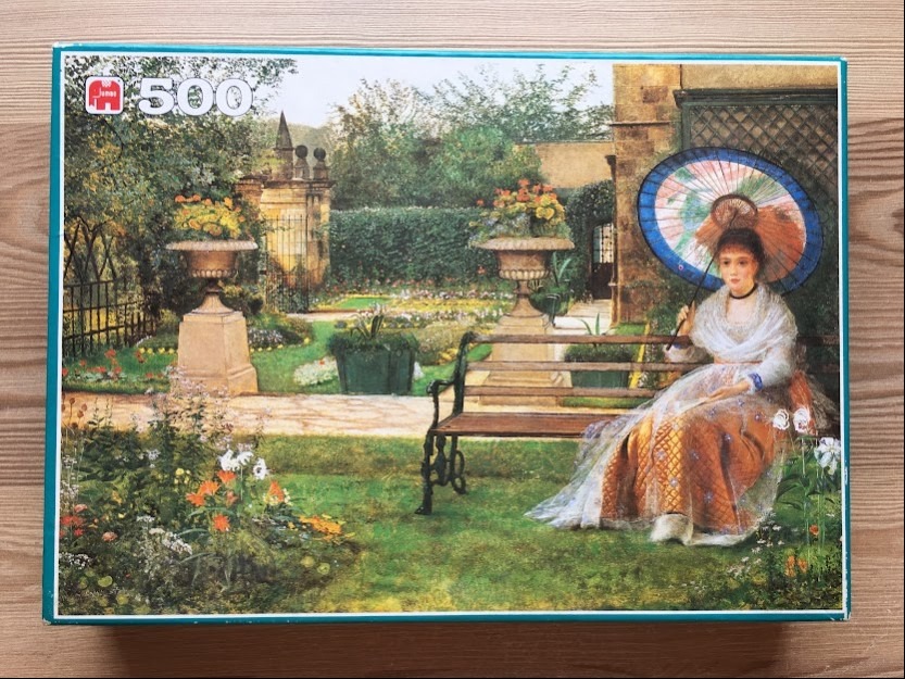An oil painting of a Victorian woman sitting on a garden bench holding a colorful parasol.
