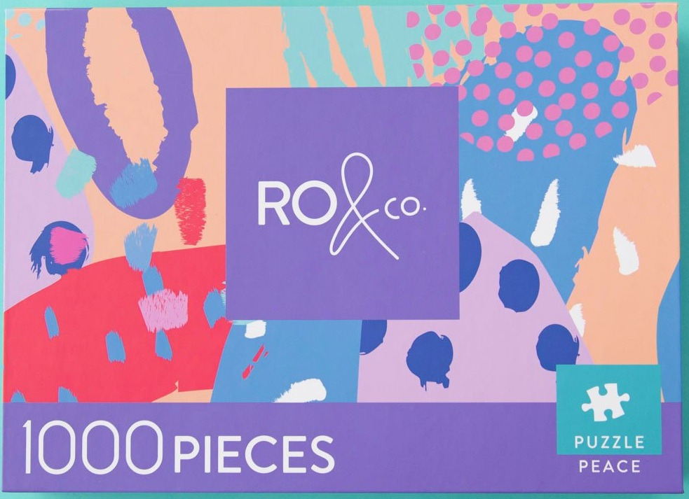 Abstract graphic pattern with organic shapes, polka dots, and a central purple square.
