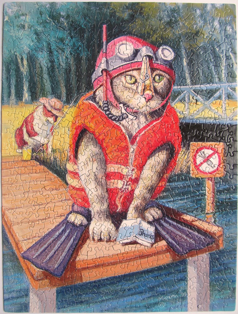A cartoon cat dressed in scuba gear sits on a wooden dock with a book about sharks.