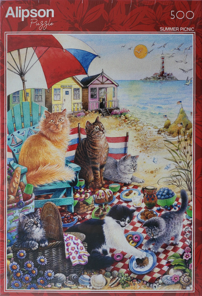 A group of cats having a picnic on a sandy beach with colorful beach huts and a lighthouse in the background.