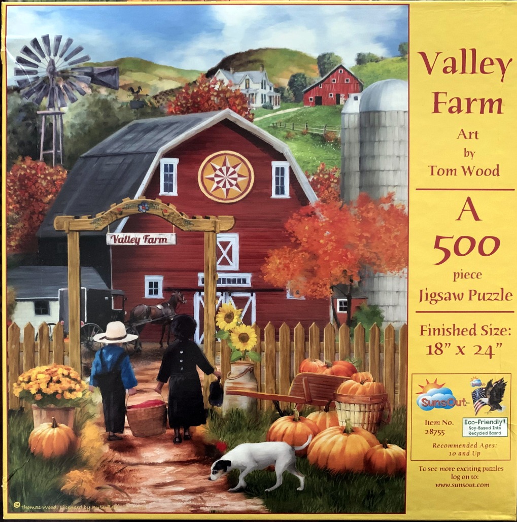 A rural autumn scene featuring a red barn, two children, and pumpkins.