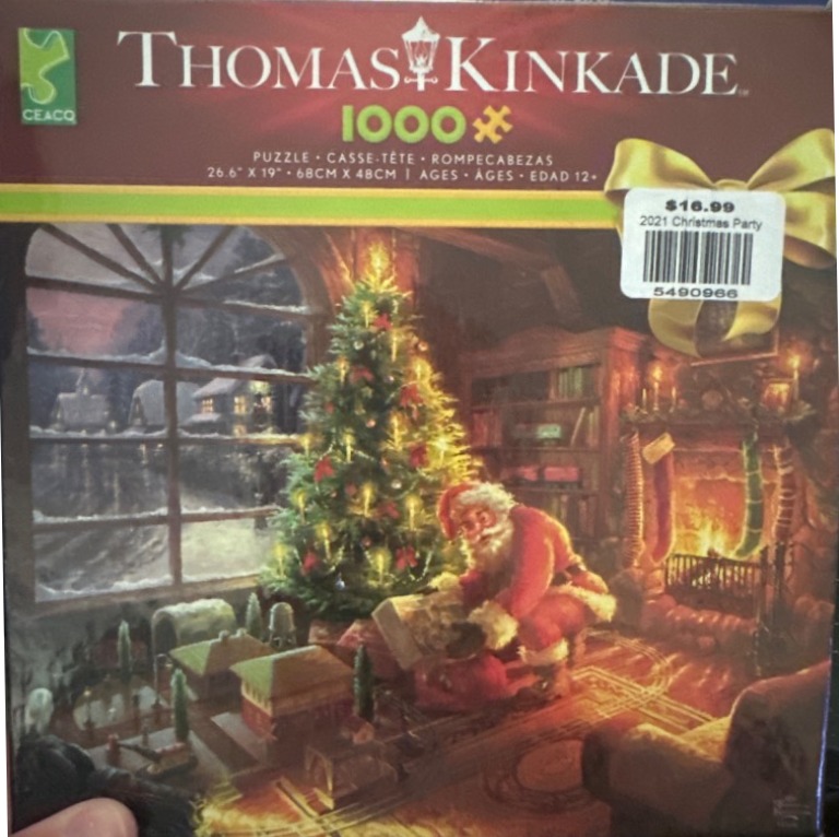 Santa Claus placing a gift under a glowing Christmas tree in a cozy room with a fireplace.