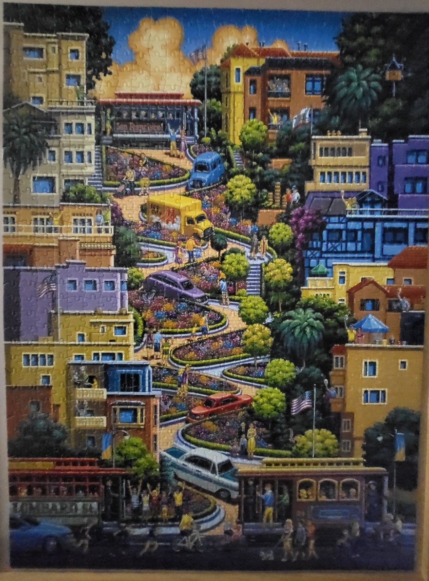 Illustration of the winding Lombard Street in San Francisco filled with cars, cable cars, and people.