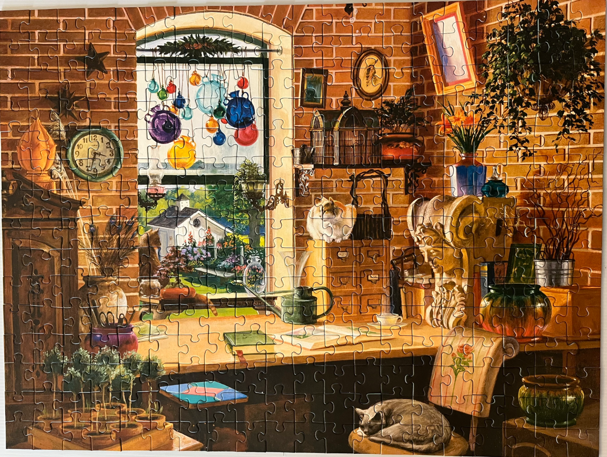 A cozy, sunlit potting shed filled with plants, hanging glass baubles, and two cats.
