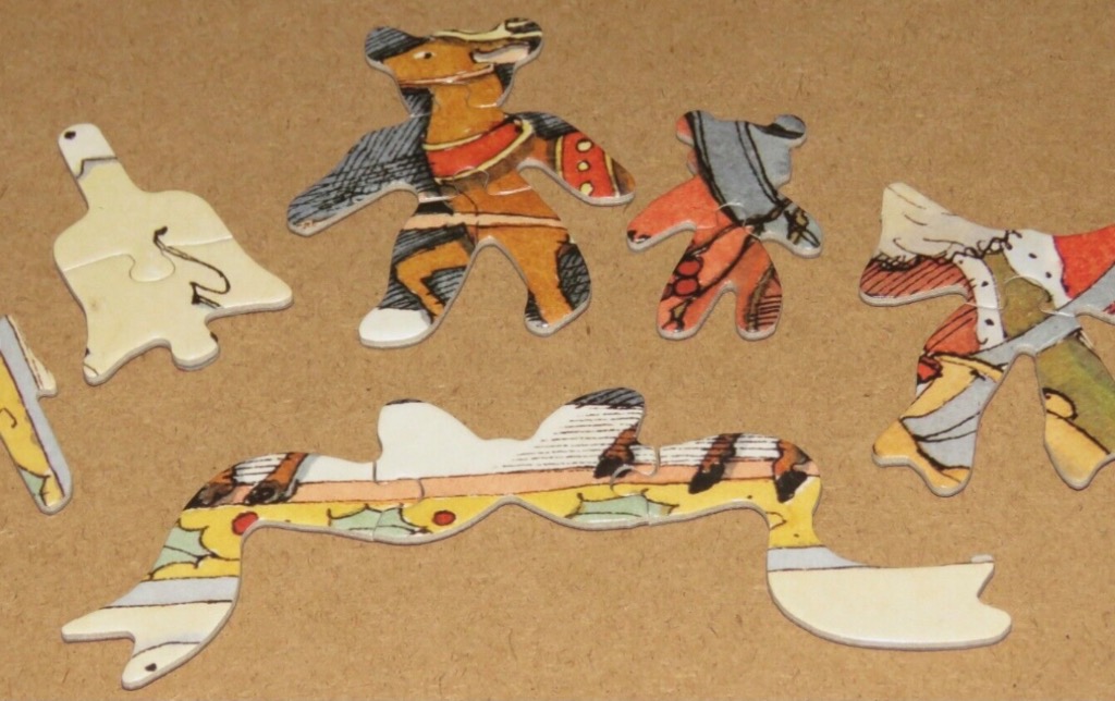 Assorted illustrated festive ornaments on a plain tan background.