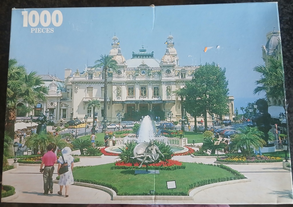 The ornate Casino de Monte-Carlo with fountains and gardens in the foreground