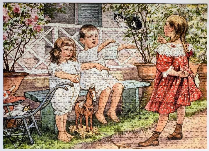 Three children playing with a cat in a garden with a toy horse.