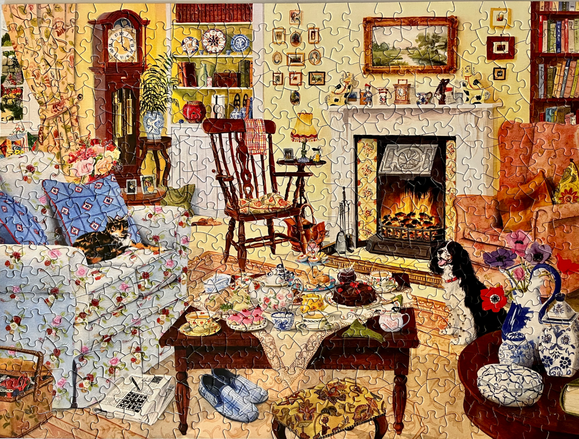 A cozy, warm living room scene featuring a crackling fireplace, a tea party, a cat, and a dog.