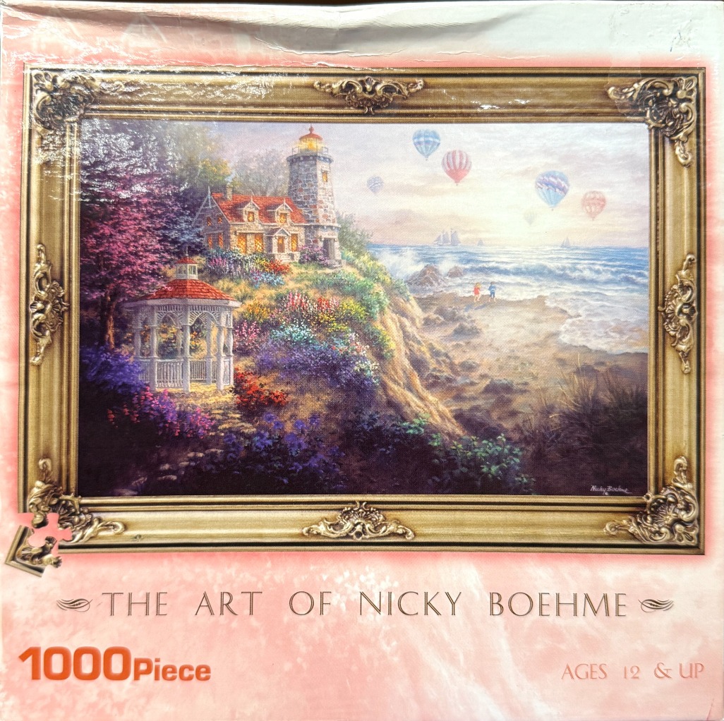 An ornate golden frame displays a coastal landscape with a stone lighthouse, a white gazebo, and hot air balloons.
