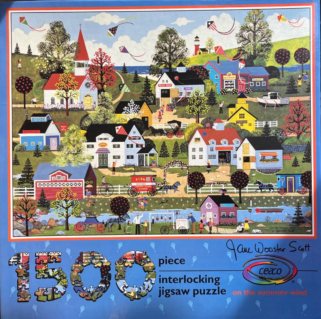 A folk art painting of a quaint seaside town with people, horse-drawn carts, and kites in a blue sky.