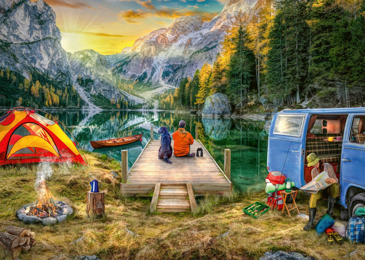 A person and their dog sitting on a wooden dock by a mountain lake at sunset, with a campfire and van nearby.