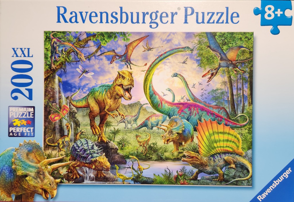 Vibrant prehistoric scene featuring a variety of colorful dinosaurs in a lush jungle landscape.