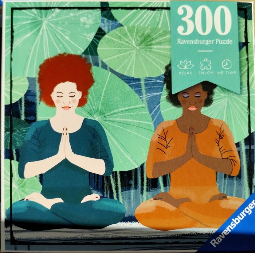 Two women with different skin tones meditating in front of large green lily pads.