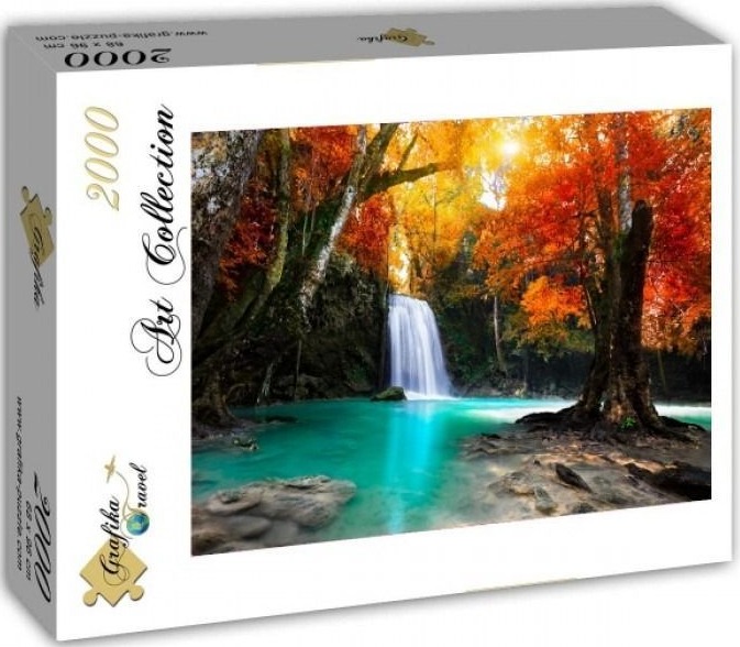 A waterfall cascades into a turquoise pool surrounded by vibrant autumn trees.