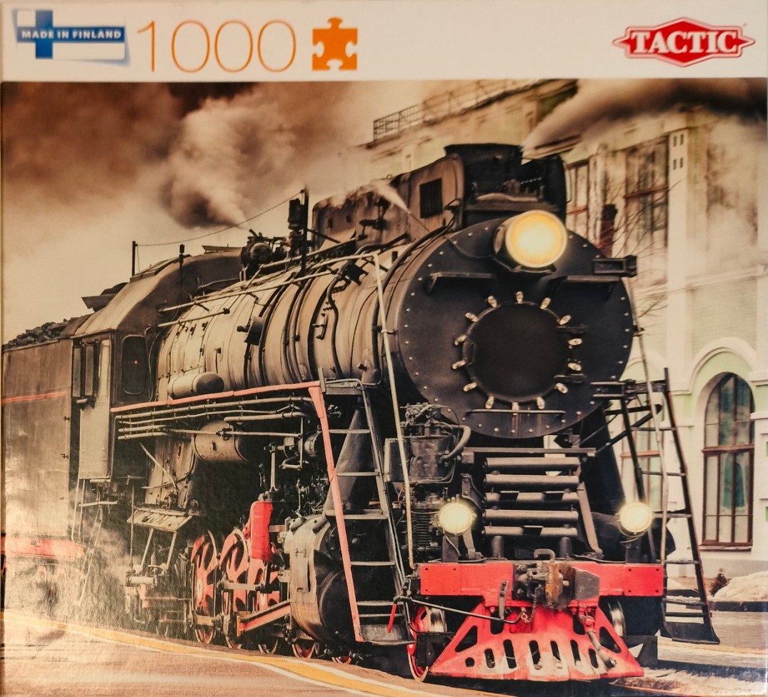 A vintage black steam locomotive pulling into a station, captured in a sepia-toned photographic style.