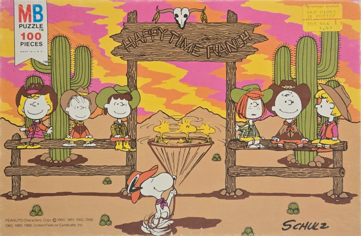 The Peanuts gang dressed as cowboys and cowgirls at a ranch with a desert sunset background.