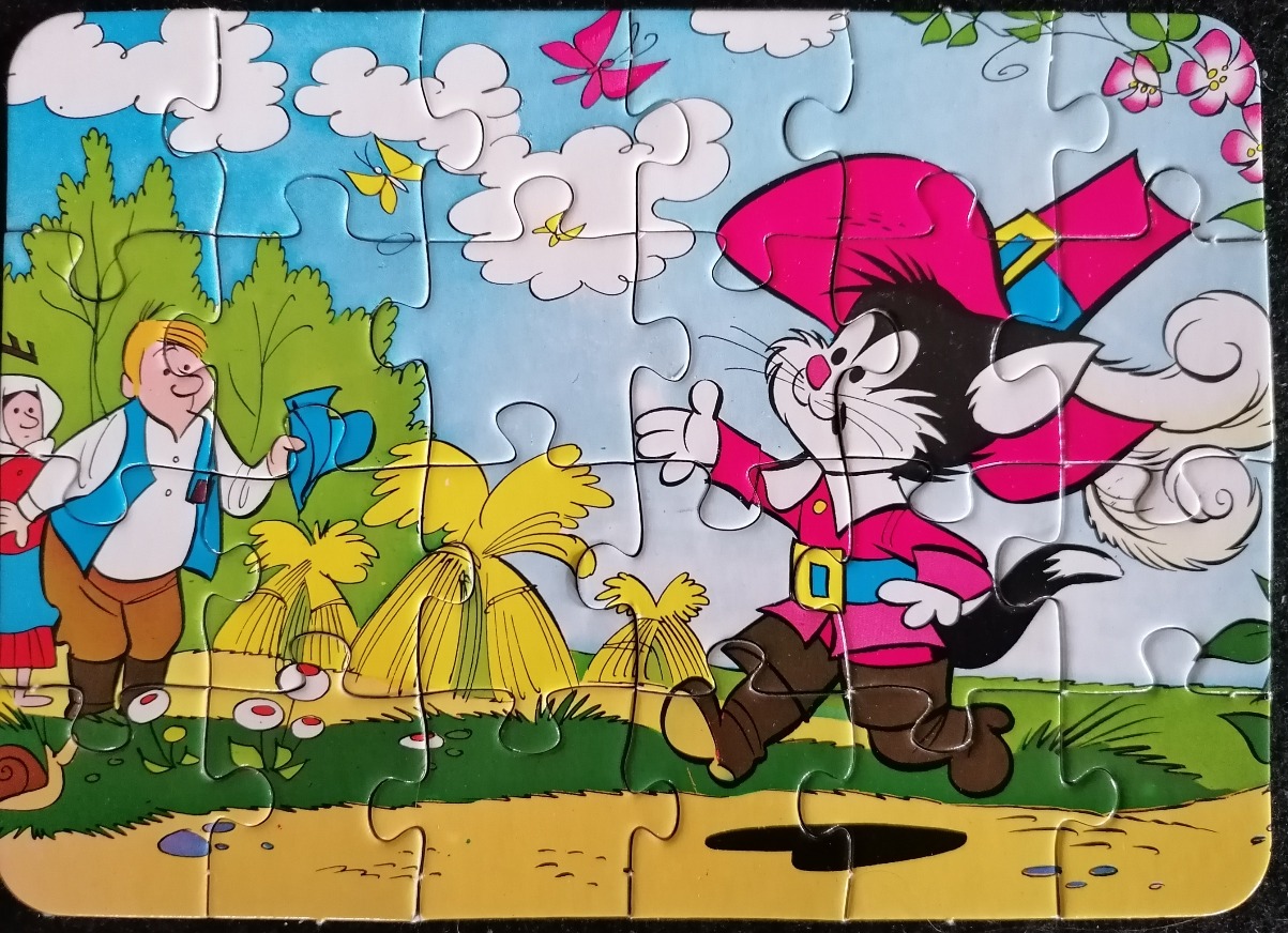 A cartoon illustration of Puss in Boots waving at a man and woman in a wheat field.