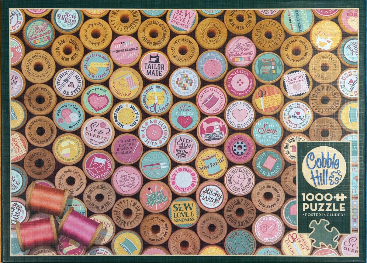 A dense pattern of wooden sewing thread spools with colorful labels featuring sewing-themed quotes and illustrations.
