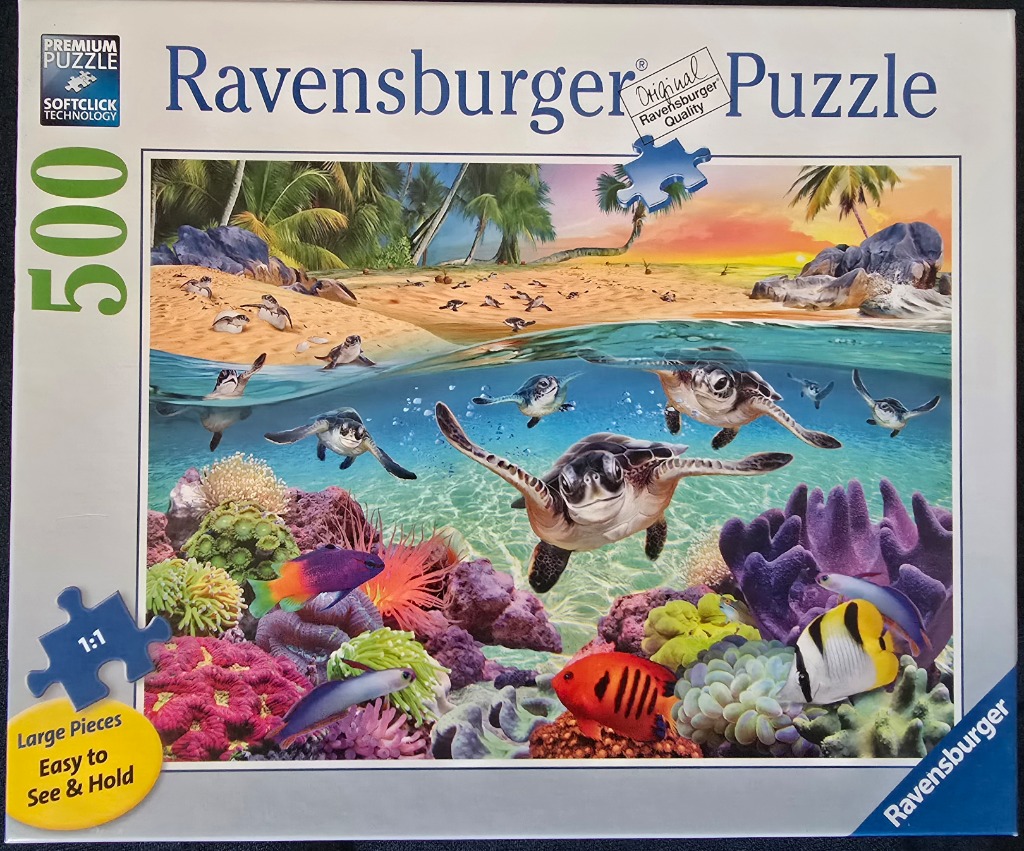 A tropical underwater scene featuring several sea turtles swimming near a colorful coral reef with a beach in the background.